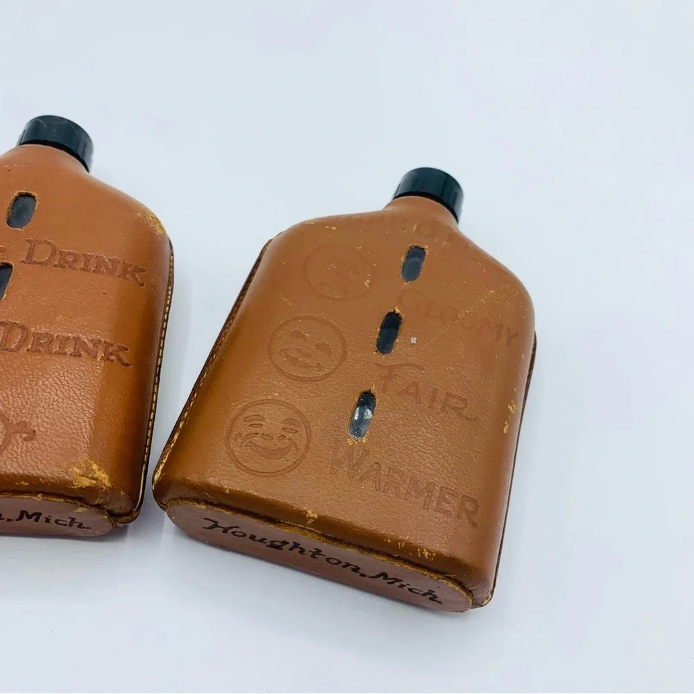 Pair Of Vintage Souvenir Leather Wrapped Glass Whiskey Flasks